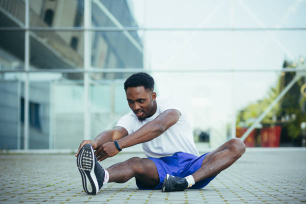 3,500+ Black Man Stretching Gym Stock Photos, Pictures & Royalty-Free ...