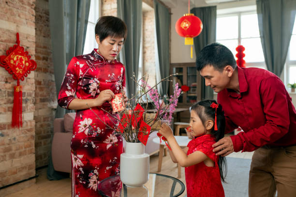 istock Young chinese family preparing for new year 1358407936