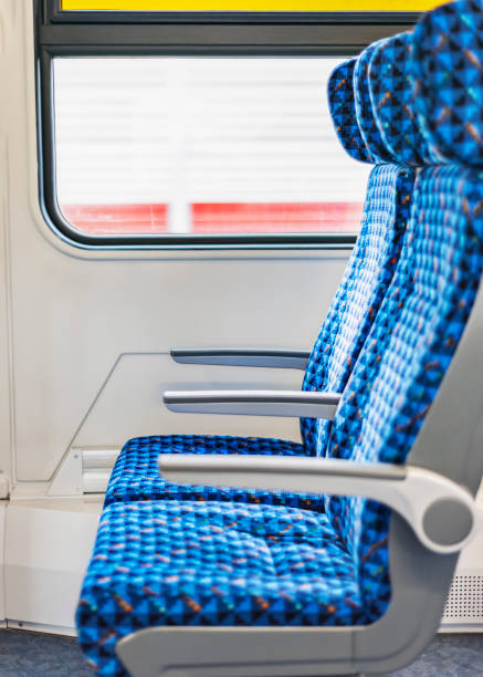istock Seats inside the train. The interior of the train car. . 1358408436