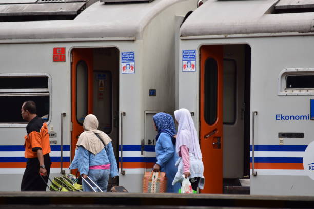 Train passengers are about to board the train to return to their hometowns. Tasikmalaya, Indonesia.