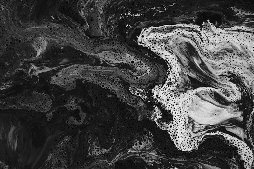 Black and white Abstract background. Marble texture. Acrylic colors in water.