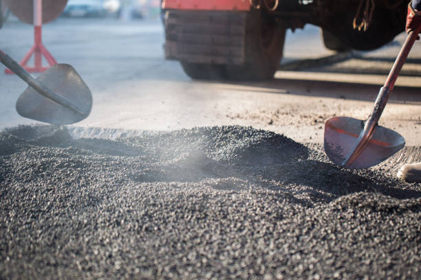 Street resurfacing. Fresh asphalt construction. Bad road Street resurfacing. Fresh asphalt construction. Bad road compactor photos stock pictures, royalty-free photos & images
