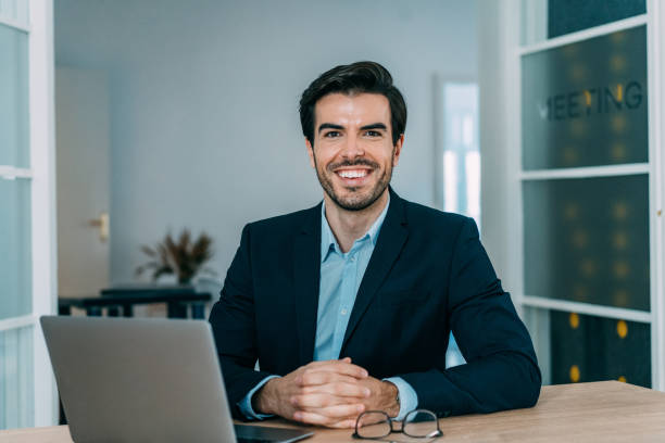 istock Confident businessman in his office. 1358414837