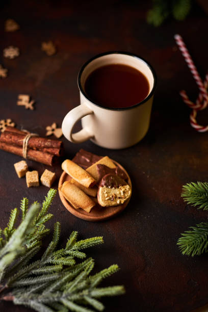 istock mug of hot chocolate surrounded by Christmas decorations 1358415050