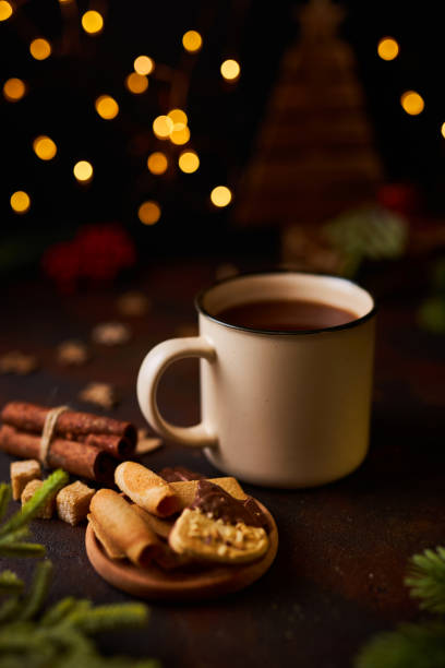 istock mug of hot chocolate surrounded by Christmas decorations 1358415066