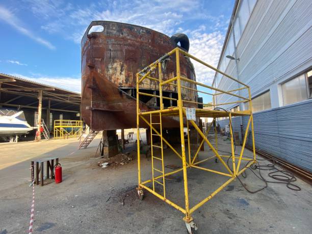 istock Dry Dock Shipyard Welding work of yachts Boats Ships - Hull 1358415142