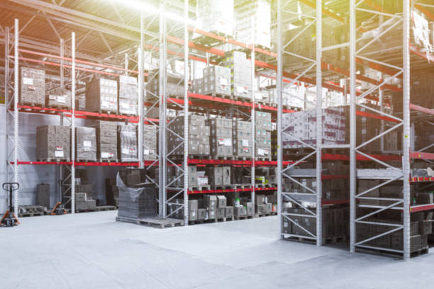 istock storage point for goods on racks large space for logistic purposes, blurred photography, defocus 1358416112