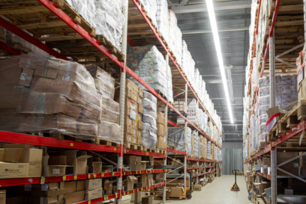 istock automated warehouse complex with high-bay shelving, blurred photography, defocus 1358416217