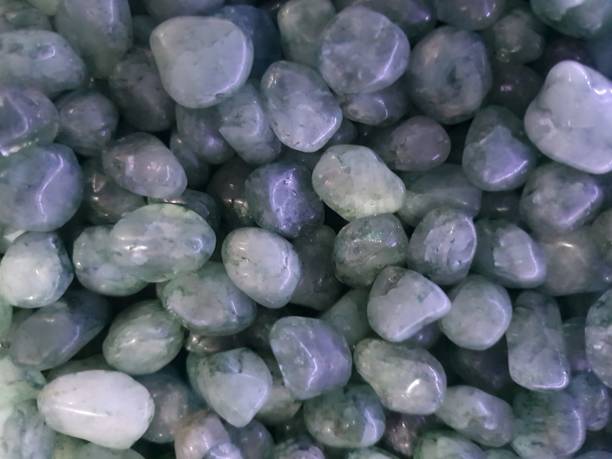 istock Close on many green quartz spheres, full screen, top view. 1358421708