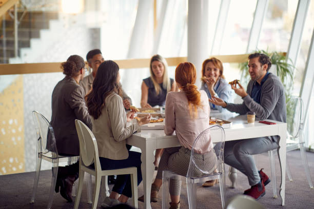 istock employees at a break.Casual  discussion colleagues. 1358423038