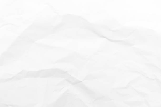 istock Grunge wrinkled white color paper textured background 1358428545