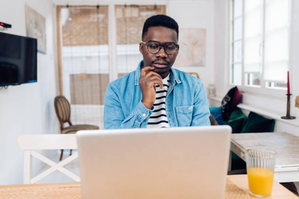 istock African-American freelancer working from home office 1358429619