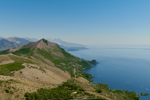Aerial view of Maratea, coast of Basilicata in Southern Italy. Beautiful mind-bending view of the sea and mountain, ideal landscape for contemplation and meditation. Wallpaper or background of nature