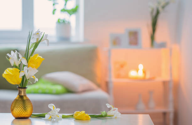 istock white home interior with spring flowers and decorations 1358432610