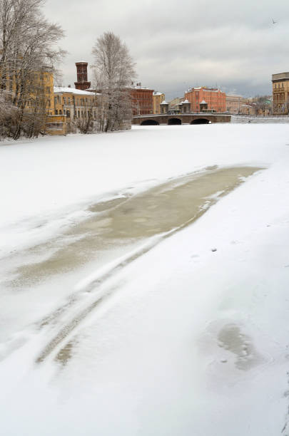 istock Frozen river in the city. 1358438163