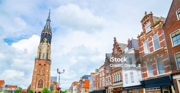 Nieuwe Kerk Tower And Traditional Houses On Market Square Of Old Beautiful City Delft Netherlands Stock Photo - Download Image Now