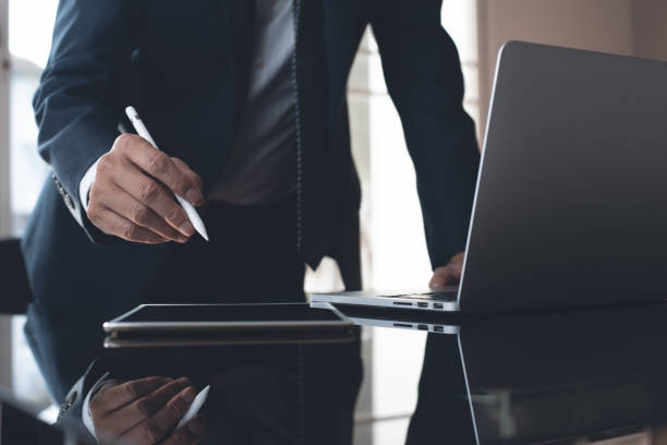istock Businessman working in modern office 1358439693