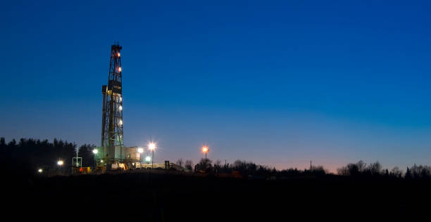 istock oil well at night 1358446280
