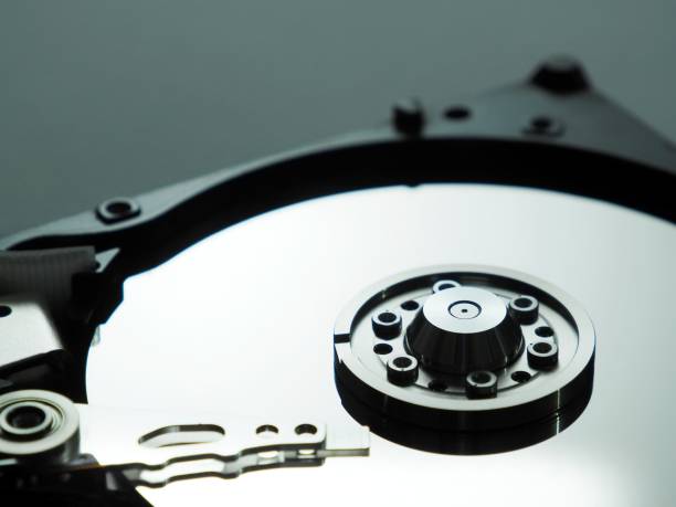 istock Close up photo of a hard disk used in an older computer. 1358447878