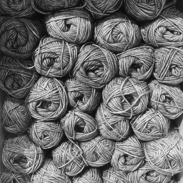 Grey balls of yarn stock photo