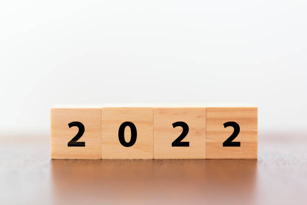 istock New year 2022 on wooden cubes on table with copy space 1358451912