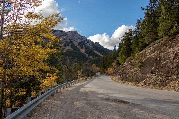 istock mountain road in Alberta, Canada 1358453223