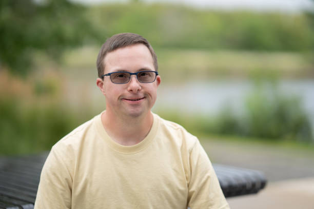 istock Portrait of a Man with Down Syndrome 1358458869