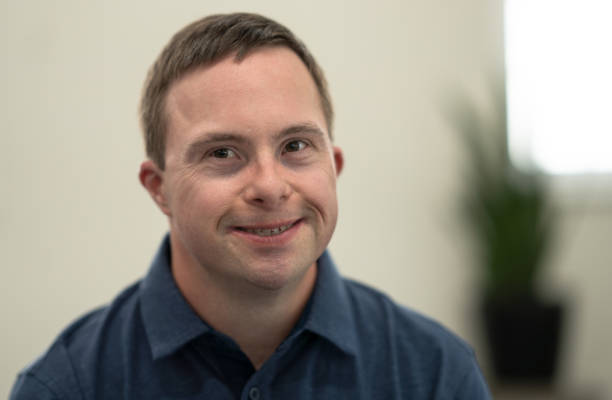 istock Portrait of a Man with Down Syndrome 1358458873