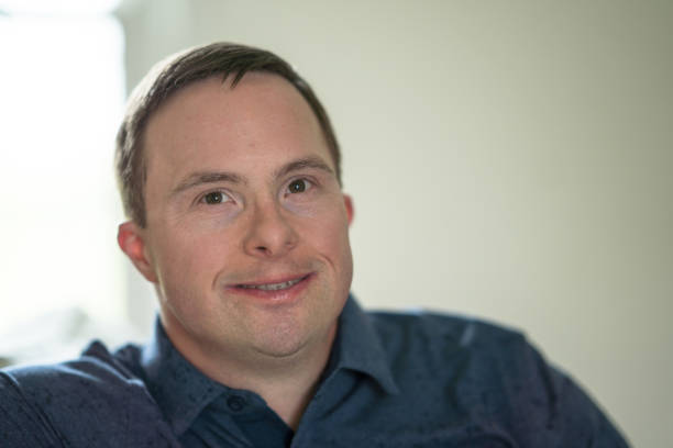 istock Portrait of a Man with Down Syndrome 1358458882