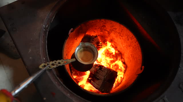 Turkish coffee is cooked on charcoal burning.