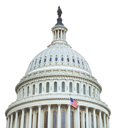 The dome of the United States capitol with an American flag isolated on white background