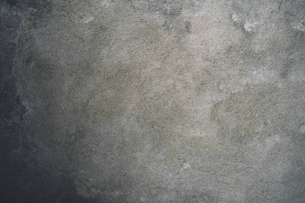 istock Beige dark gray stucco cracked wall texture background 1358464350