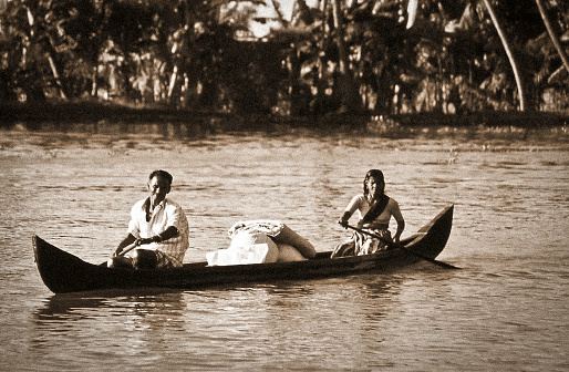 Young man sitting on a gondola in Venice. 1941.