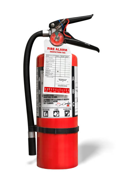 Fire extinguisher with inspection tag. Portable ABC or multi-purpose dry chemical fire extinguisher with monoammonium phosphate. Isolated on white. fire extinguisher photos stock pictures, royalty-free photos & images