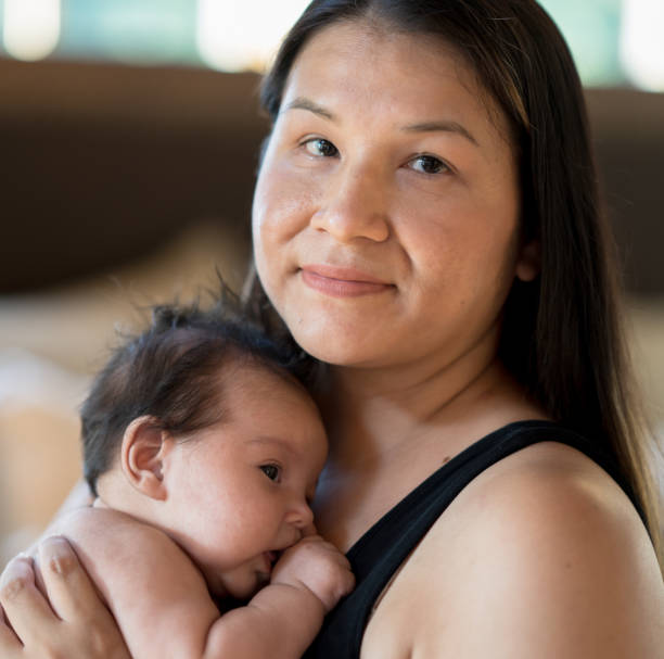 istock Indigenous Mother Bonding with her Newborn 1358470212
