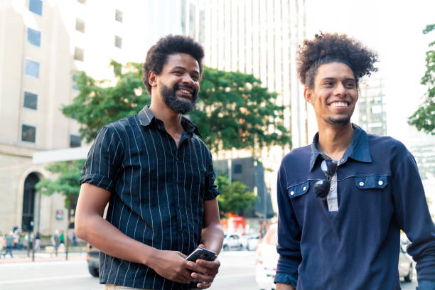 istock Two friends at Paulista Avenue 1358470279