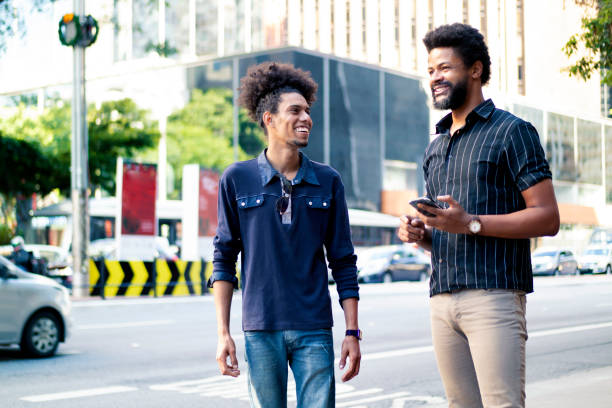 istock Two friends at Paulista Avenue 1358470322