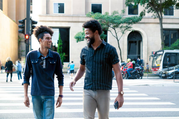 istock Two friends at Paulista Avenue 1358470334