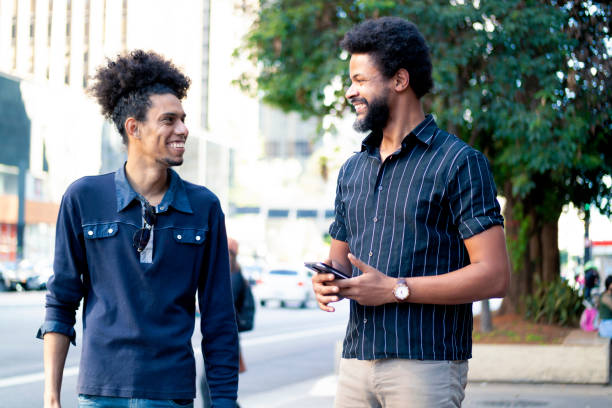 istock Two friends at Paulista Avenue 1358470369