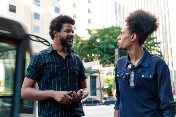 istock Two friends at Paulista Avenue 1358470436