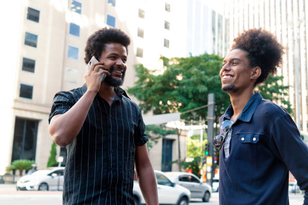 istock Two friends at Paulista Avenue 1358470442