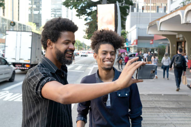 istock Two friends at Paulista Avenue 1358470515