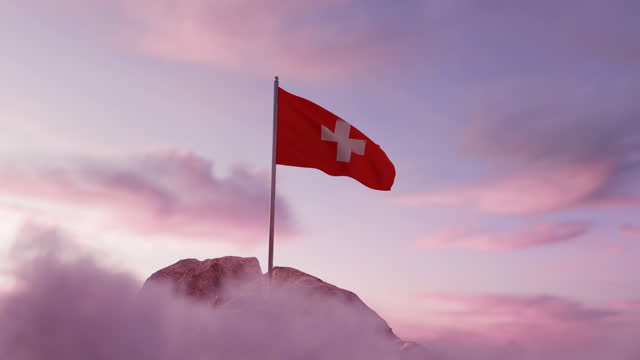 animation of waving Swiss flag on rocky landscape and white clouds