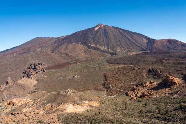 istock Pico de Teide and Roques de Garcia in front view 1358476090