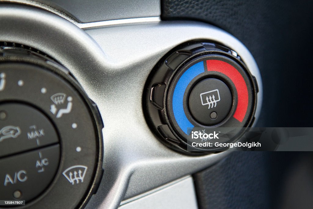 Conditioner and air flow control Conditioner and air flow control in a modern car Adjusting Stock Photo