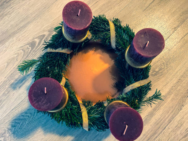 istock An Advent wreath on a wooden floor. 1358480986