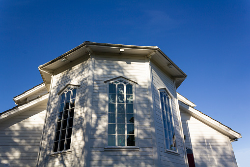 White wooden church windows