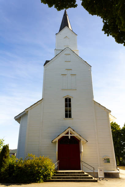 istock White wooden norwegian church 1358481149