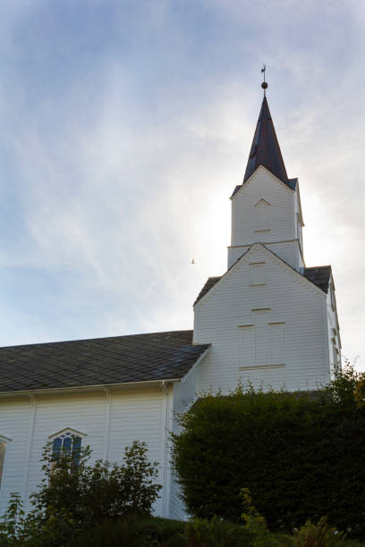 istock White wooden church tower 1358481153