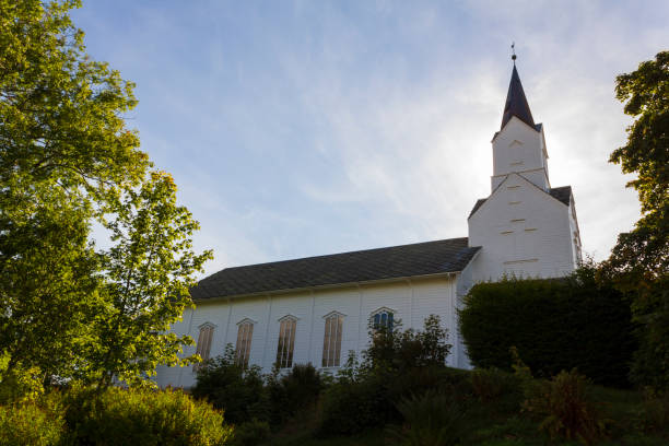 istock White wooden norwegian church 1358481156
